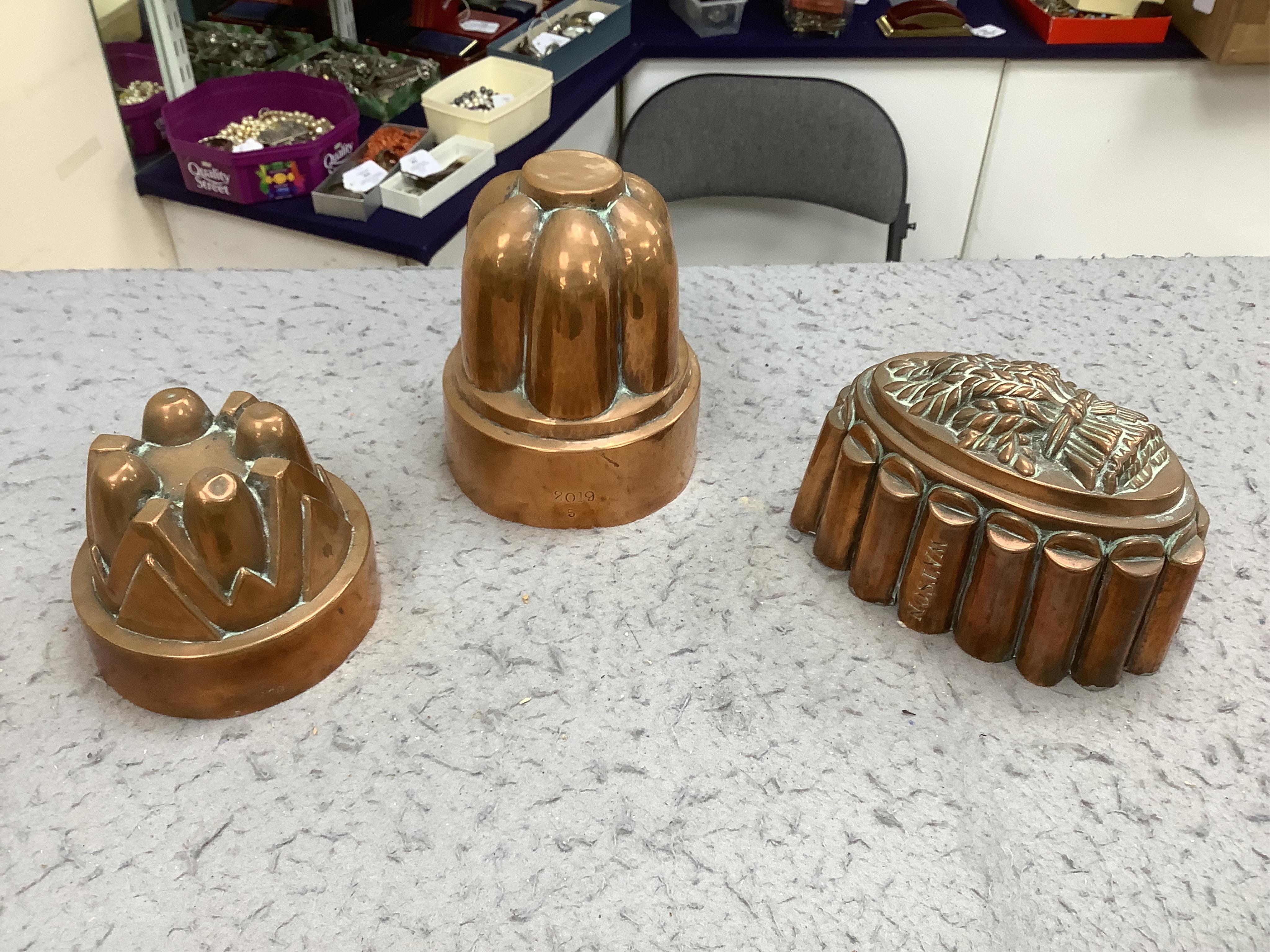 Six Victorian copper jelly moulds, tallest 14.5cm high. Condition - good